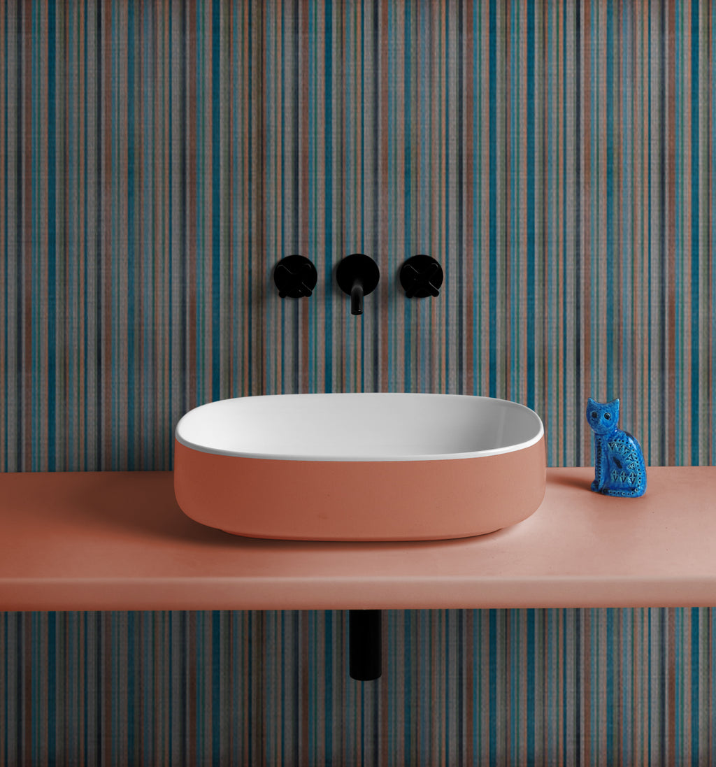 scenografia lavabo ovale Bucchero Bis bianco e arancio cammeo